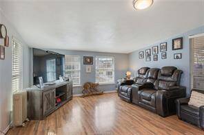 Living room with open concept, And laminate flooring