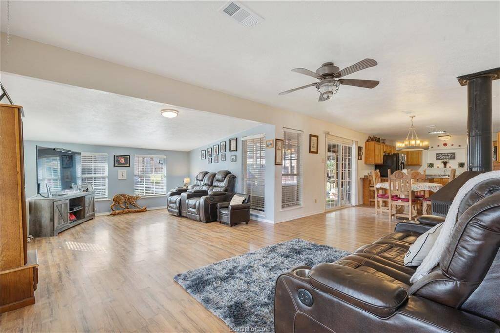 Living room with wood burning fireplace