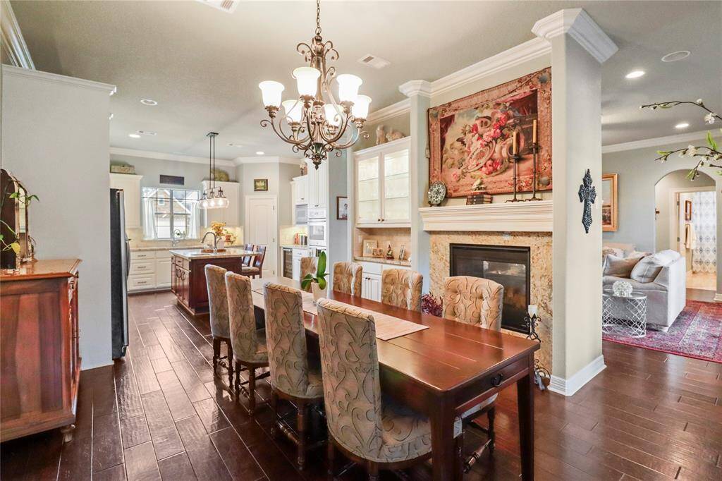 This house is Gorgeous and custom finishes. Check out that double sided fireplace! Absolutely beautiful!