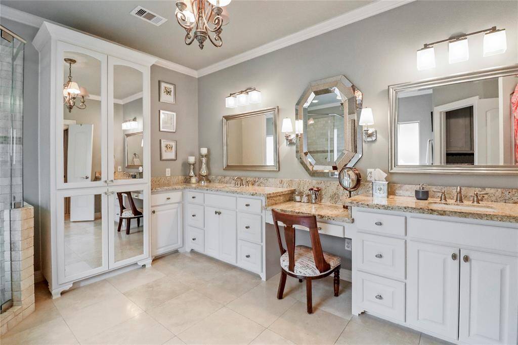 This bathroom is BEAUTIFUL with double sinks and vanity