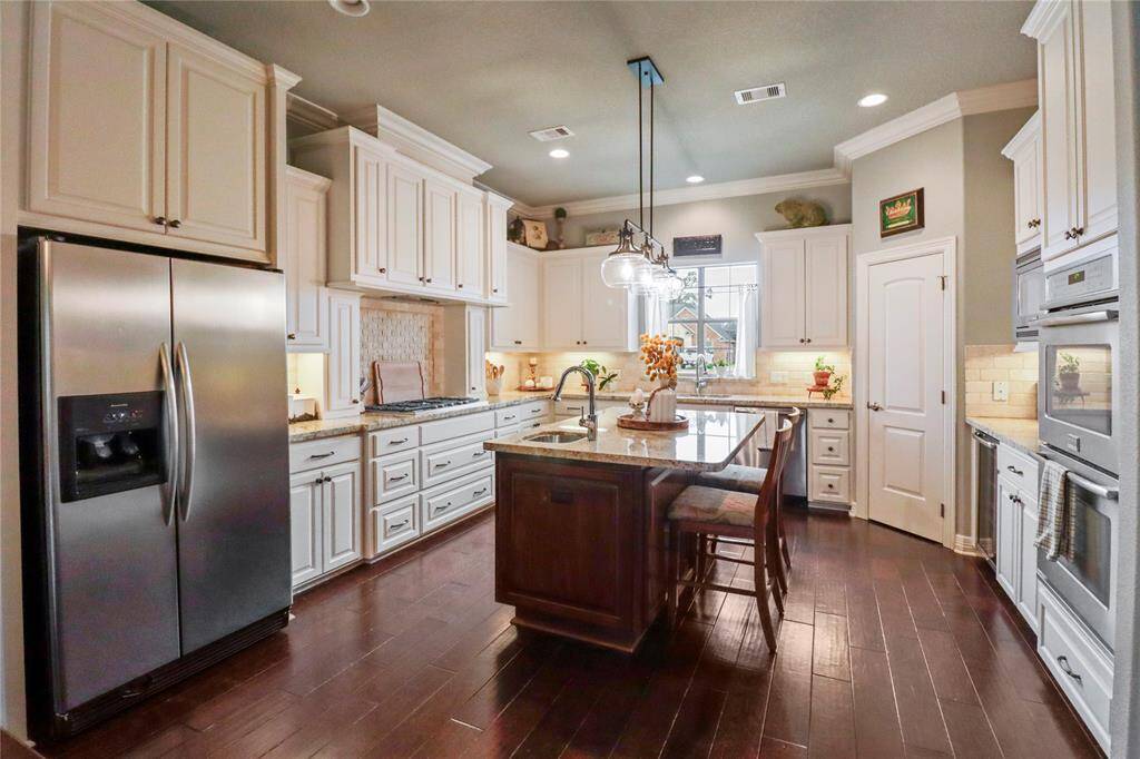 So many cabinets in this custom kitchen
