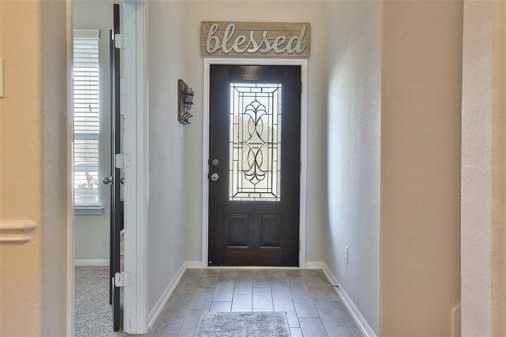 Step into your new home, filled with natural light that creates a warm and inviting atmosphere throughout.