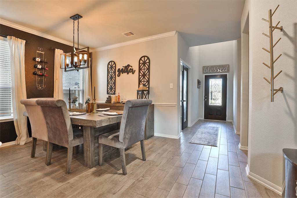 Step into the dining room, where you can relax and enjoy your meal in a welcoming space.
