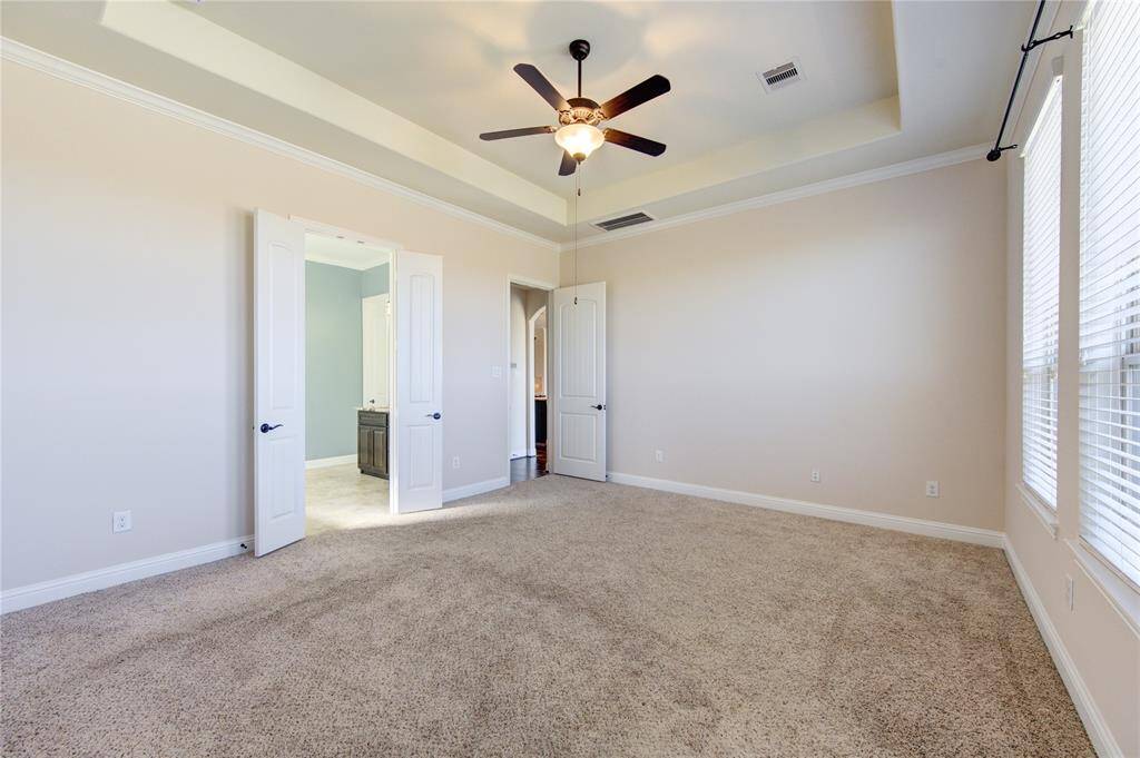 The master room has access to an ensuite bathroom and a separate doorway, providing convenience and privacy.