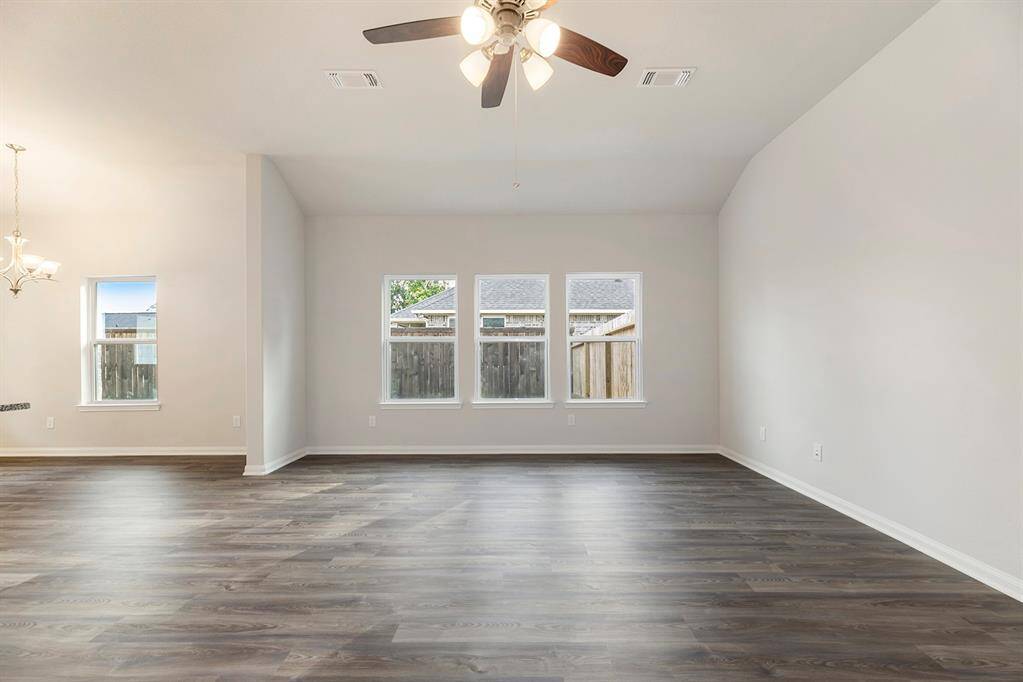 Large living room with plenty of natural light