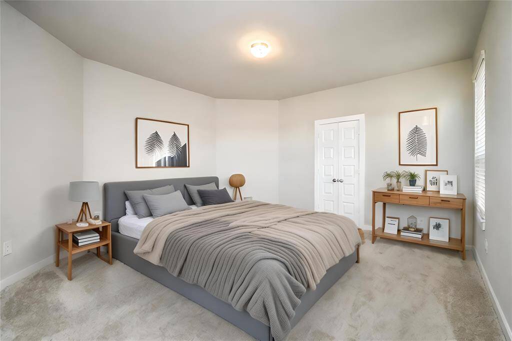 *Virtually Staged* Primary Bedroom. Sample photo of completed home with similar floor plan. Actual colors and selections may vary.