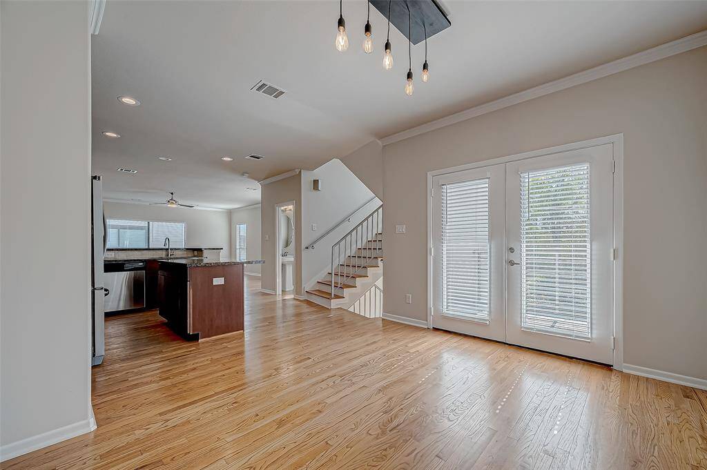 DINING AND EXIT TO SECOND FLOOR BALCONY