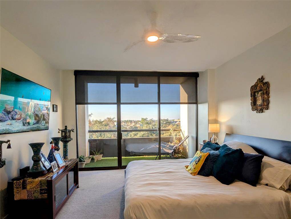 Master bedroom features a west facing balcony, ethernet connections, and drop-down ceiling fan for comfort and proper air circulation.