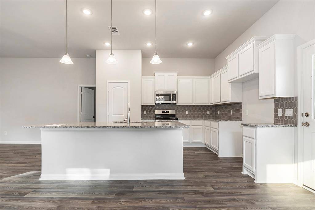 Kitchen open to dining area