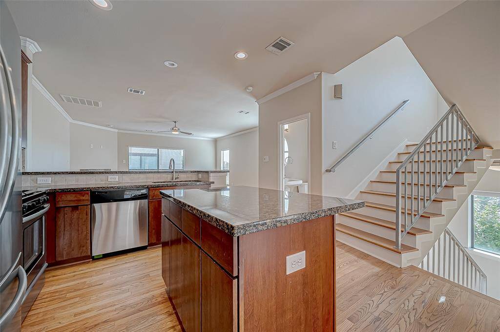 KITCHEN/STAIRWAY LEADING TO 3RD FLOOR