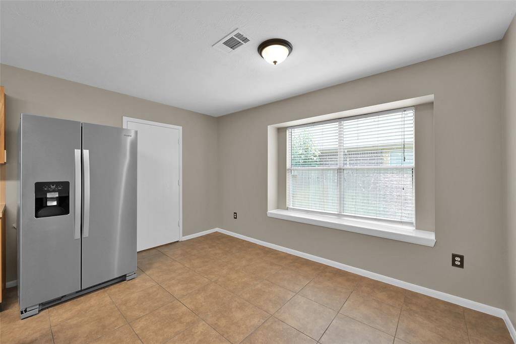 Brunch area & door goes to pantry/laundry