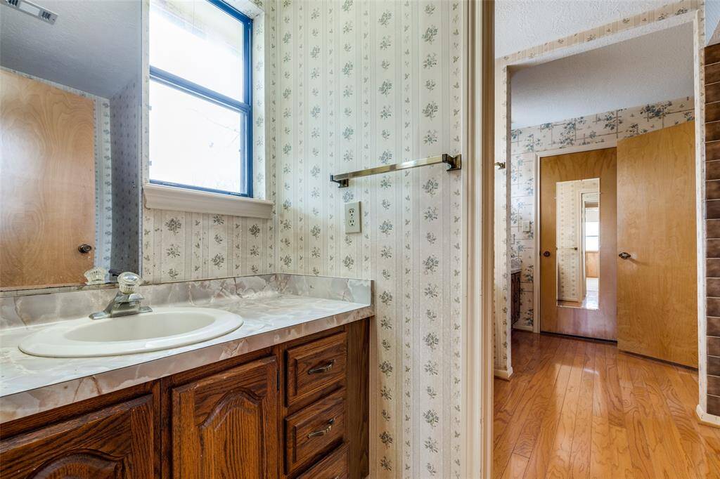 Sink and vanity of second floor main bathroom