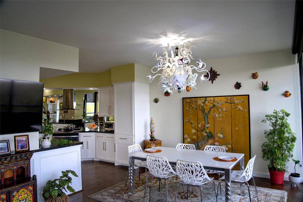 The open layout with the dining space and kitchen flows naturally.