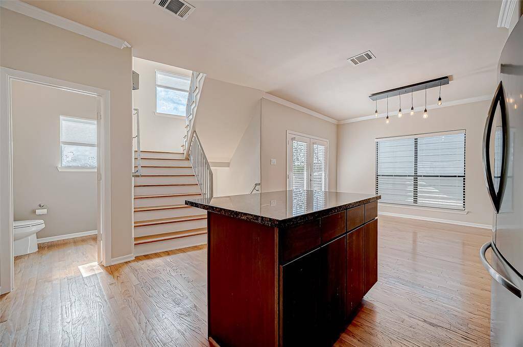 KITCHEN/STAIRWAY/SECOND FLOOR BALCONY ENTRANCE