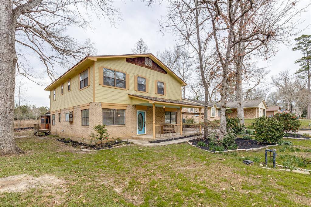 Mature trees and landscaped yard