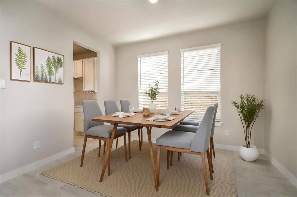 *Virtually Staged* Dining Room. Sample photo of completed home with similar floor plan. Actual colors and selections may vary.