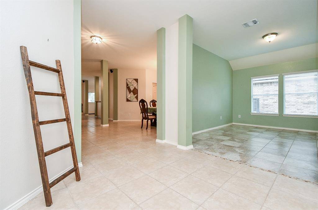 Versatile space perfect for a home office or creative flex room.