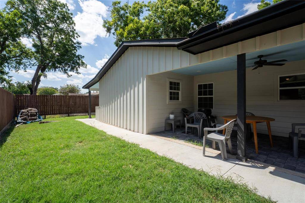 Unit 2 - side yard and covered patio just off of the kitchen