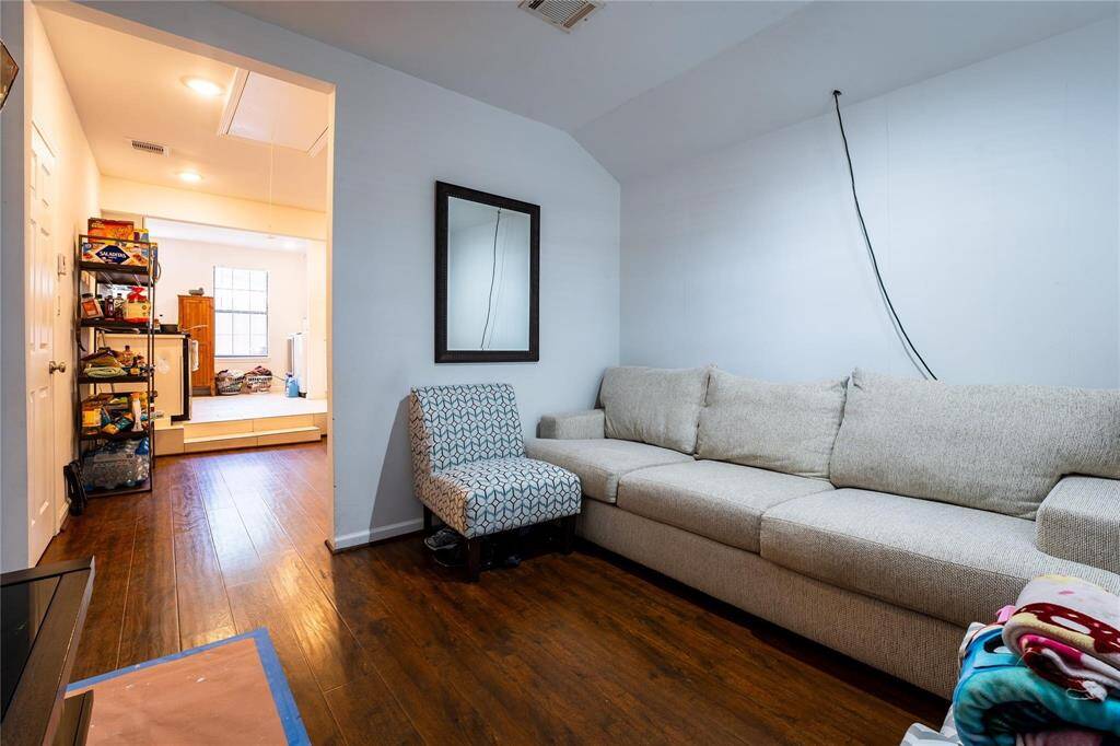 Unit 1 - family room leading to dining area and kitchen