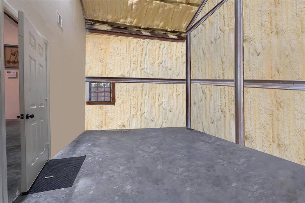 Office - connected storage warehouse / flex room (virtually staged) with half bathroom; and laundry room for a full-sized washer and dryer.