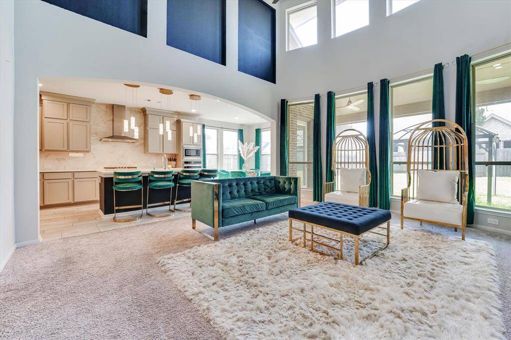 Living room with elegant fireplace, gives you ambience and boasts coziness