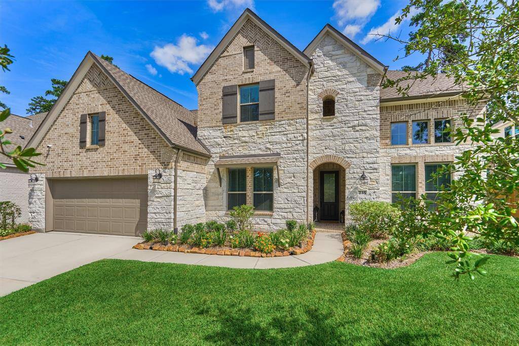 Enjoy Beautiful Curb Appeal With This Brick & Stone Elevation Situated In Grand Central Park!