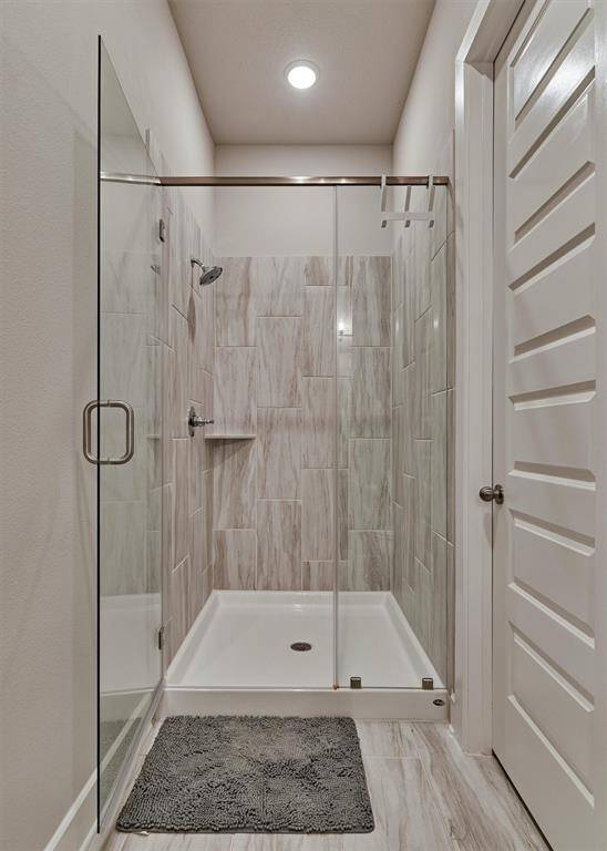 The Second Full Bath Downstairs Features A Walk-In Shower And Walk-In Closet.