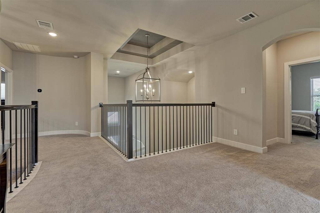 The Landing Also Overlooks The Front Entry.