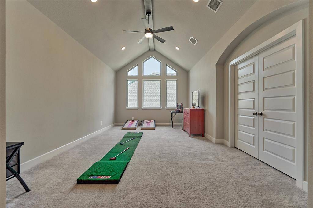 Hours Of Fun Await In The Bright, XL Game Room; The Room Features A Vaulted Ceiling, Fan, And Lots Of Windows That Fill The Room With Natural Light.