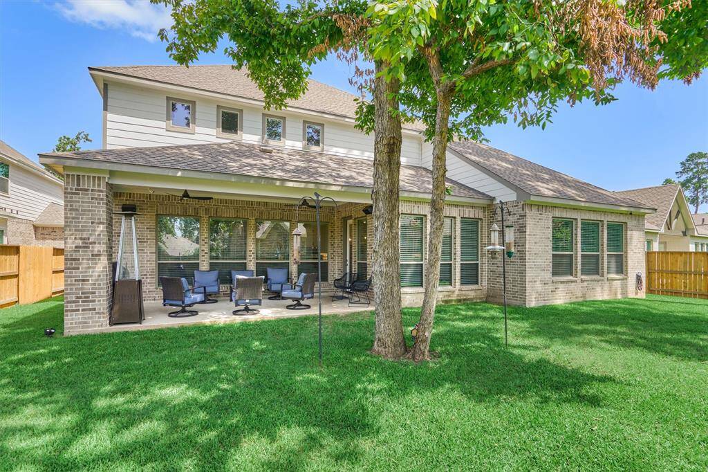 A Closer View Of The Back Patio Reveals That It Also Offers Two Smart Tech Fans (Similar To The Garage) To Keep The Air Moving And A Gas Stub-Out For A Future Summer Kitchen.