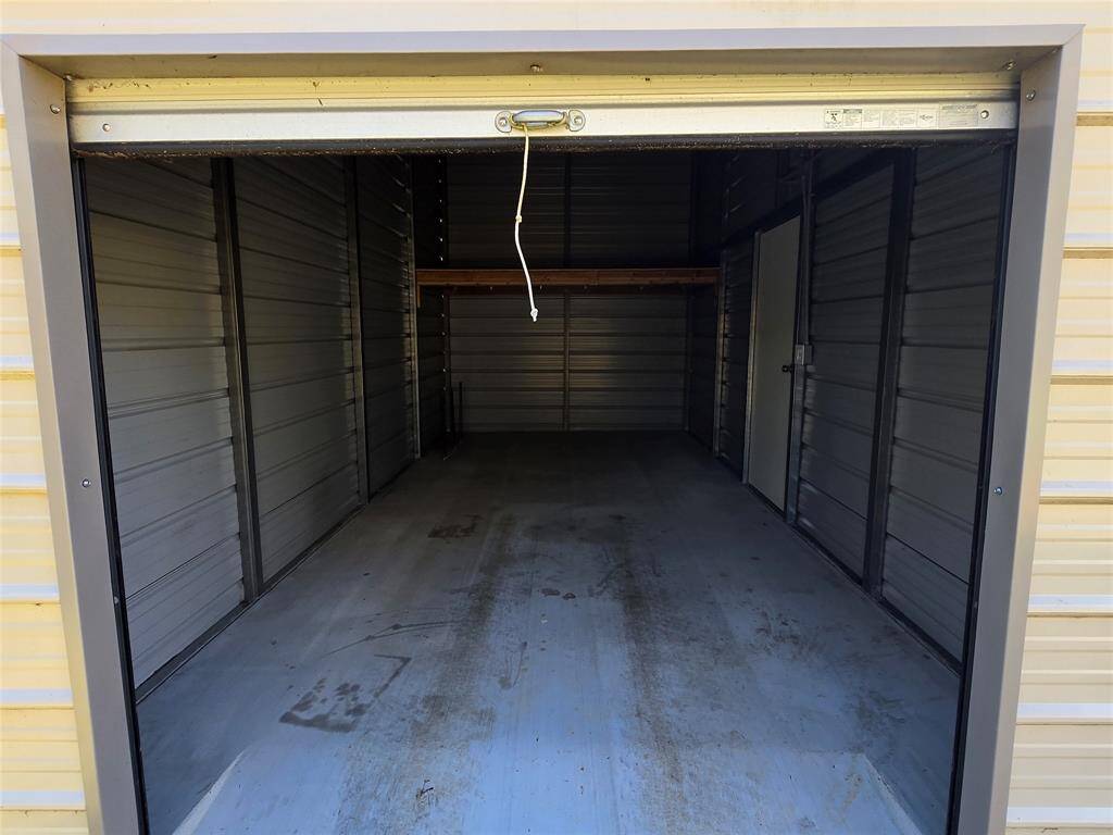 Shed with loft. Concrete ramp for golf cart/ mower