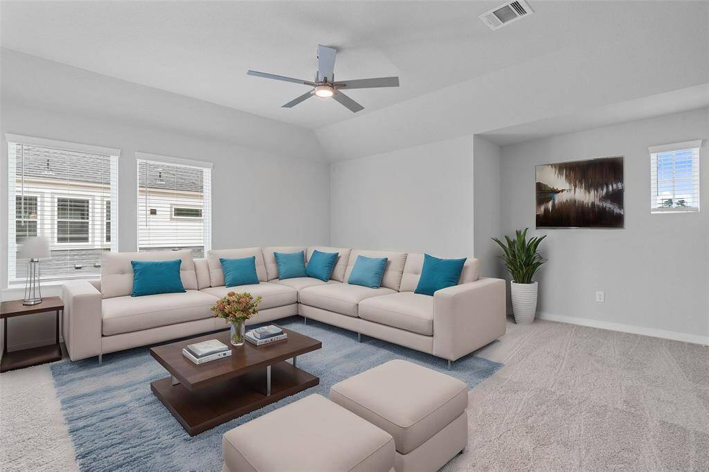 This spacious and bright game room features custom paint with gorgeous plush carpet, and large windows! With the ample amount of space provided, you can turn this area into anything! From a game room to a children's play room, the possibilities are endless!
