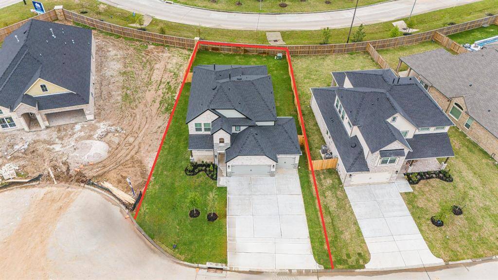 This home sits on a large lot WITH NO BACK NEIGHBORS, ample space in front and the back, lush landscaping and a well-maintained yard.