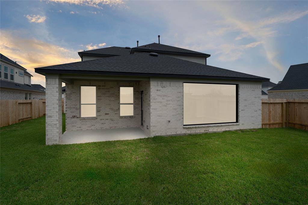 Come and see this spacious backyard with its beautiful covered patio. There is plenty of room for the kids to play and adults to relax! Perfect for your outdoor living space, patio furniture, bbq pit, and so much more. The possibilities are endless!