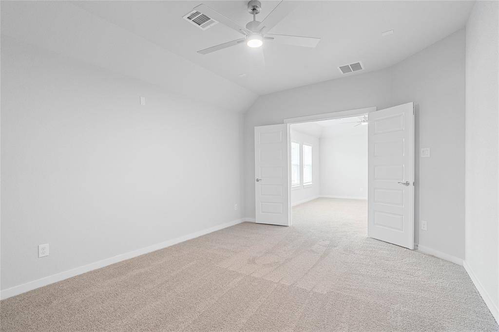 Additional view from the media room featuring the double doors!