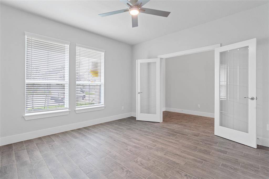Another view taken from home office/study looking towards the entryway featuring the gorgeous French doors.