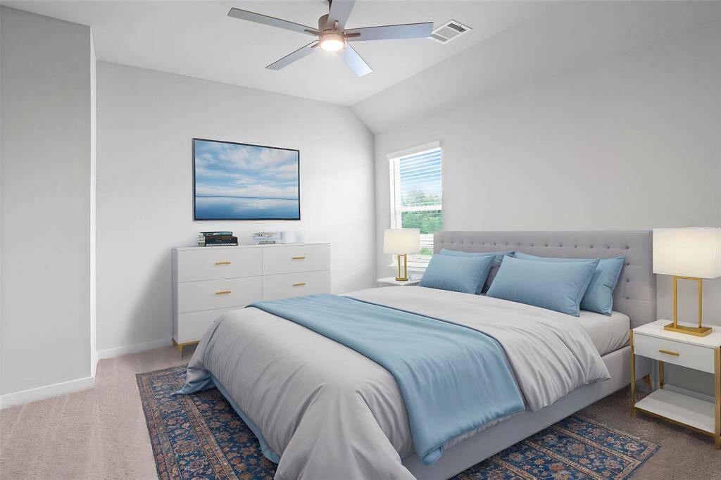 Secondary bedroom features plush carpet, custom paint, ceiling fan with lighting, large window with blinds, and closet space.