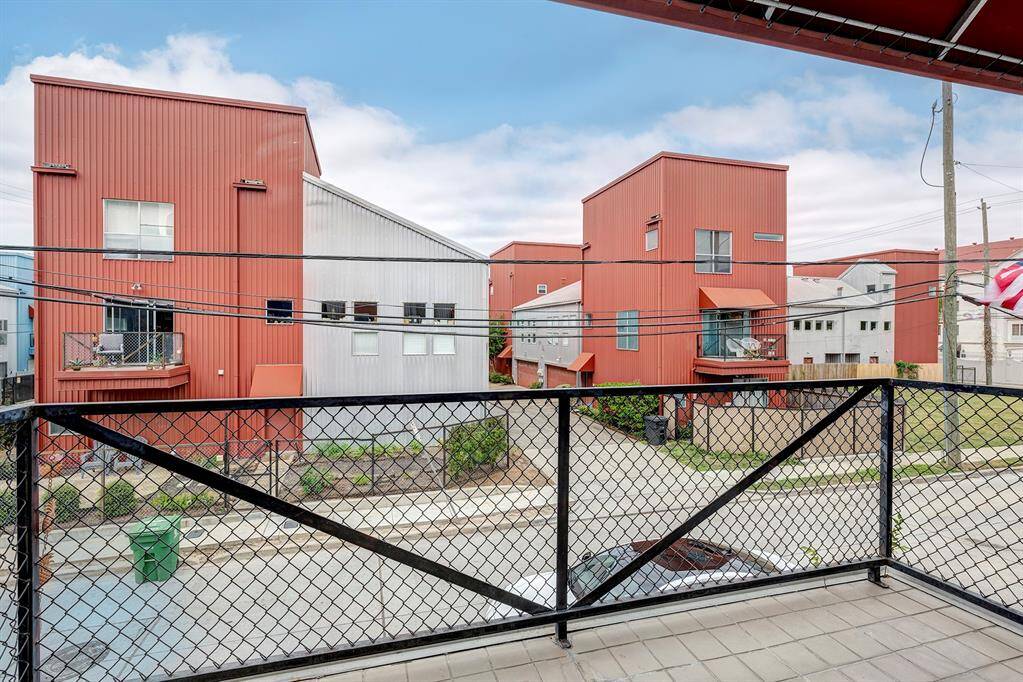 The second floor balcony right off the living aea provides enough space for the BBQ grill.