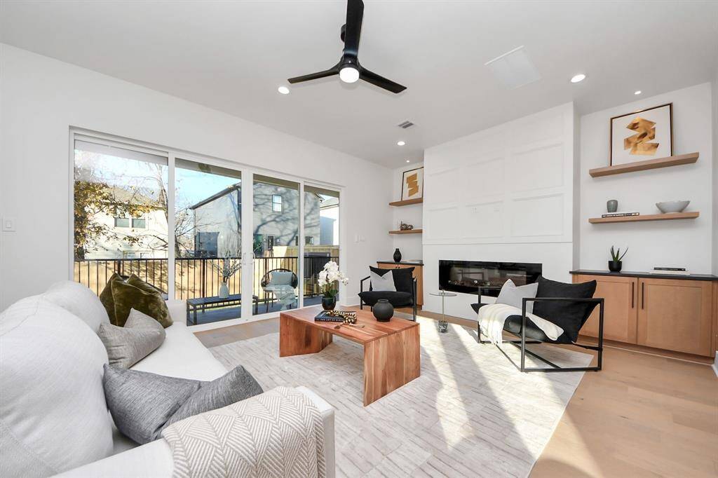 A rare find, this home boasts a large 4-panel sliding door, providing a wider, more seamless connection to the outdoors, enhancing both the flow and natural light in the space
