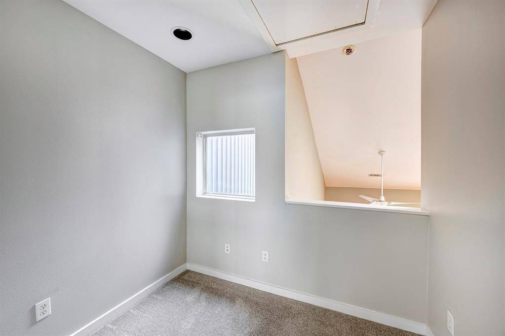 Study area located off the third floor primary suite is a great space for that home office.