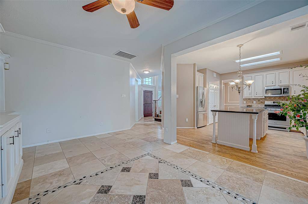 Den open to the kitchen.