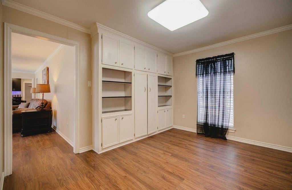another view of flex room w built in storage