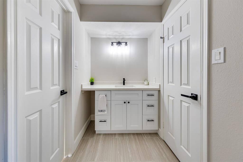 view form main bedroom. Bathroom on left door and walk in closet on right door.