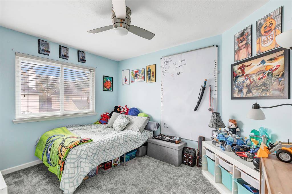 Secondary bedroom with large closet space.