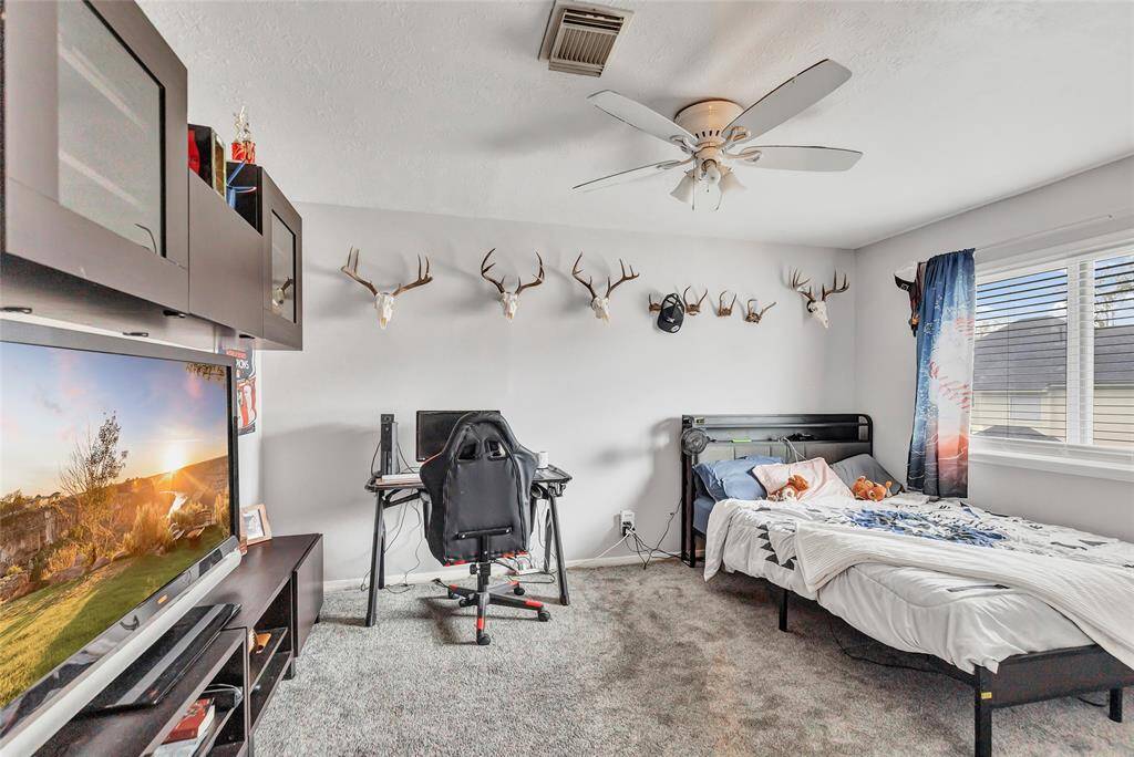 Secondary bedroom with large closet space.