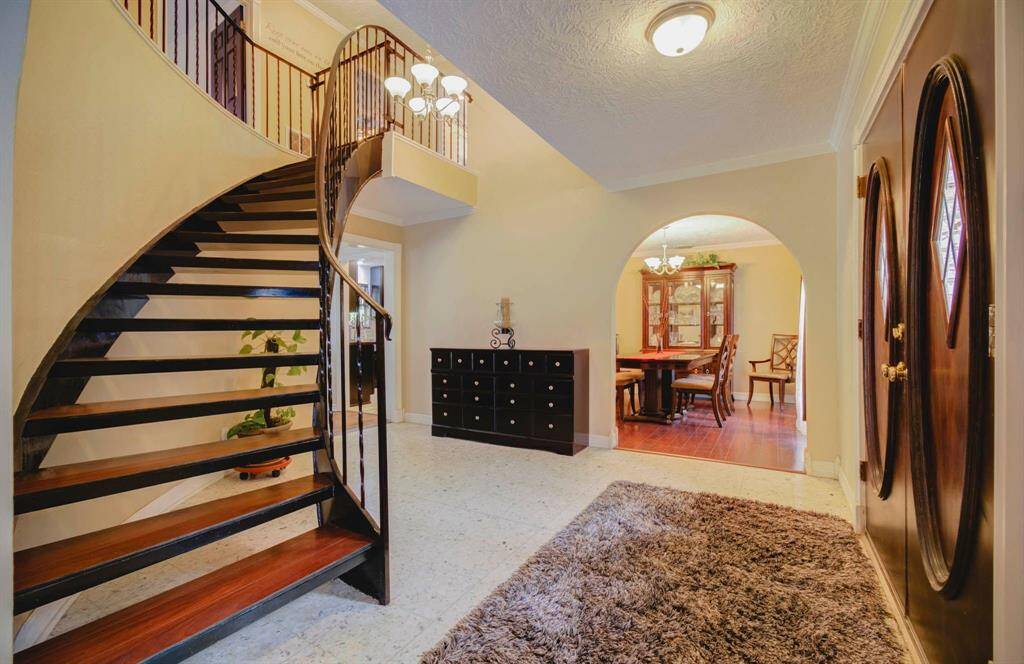 Entry room showing formal dining to the right