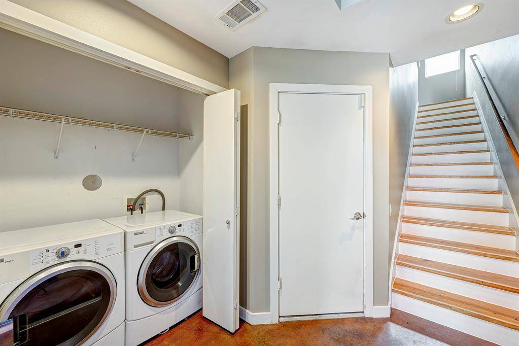 The utility room is located on the first floor( doors that cover the W/D) and has a huge closet for storage.