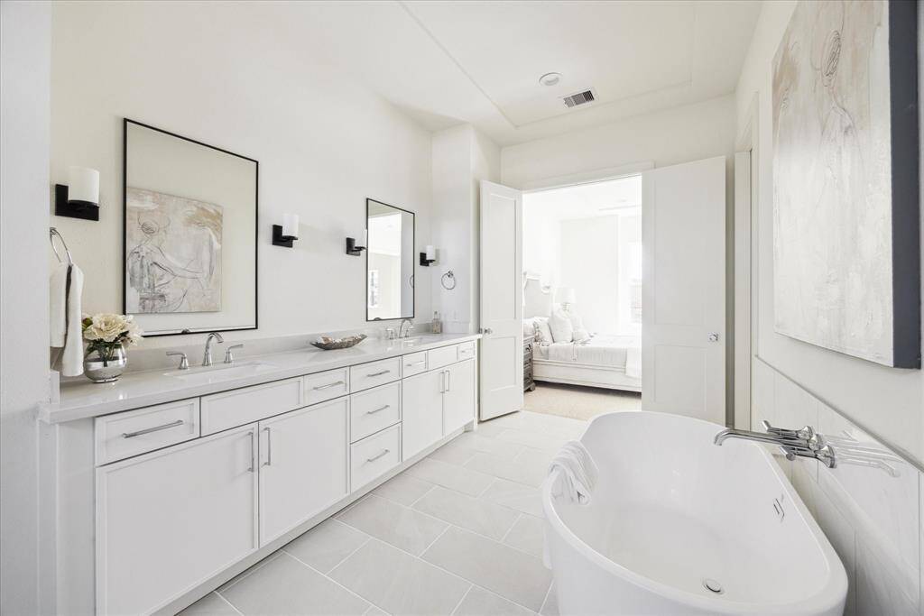 Magazine Worthy – No detail left behind, timeless design, upscale features, this exquisite owner's bath is Joy to behold with freestanding soaking & tub frameless shower attached to his/hers closet making your morning routine a breeze.
