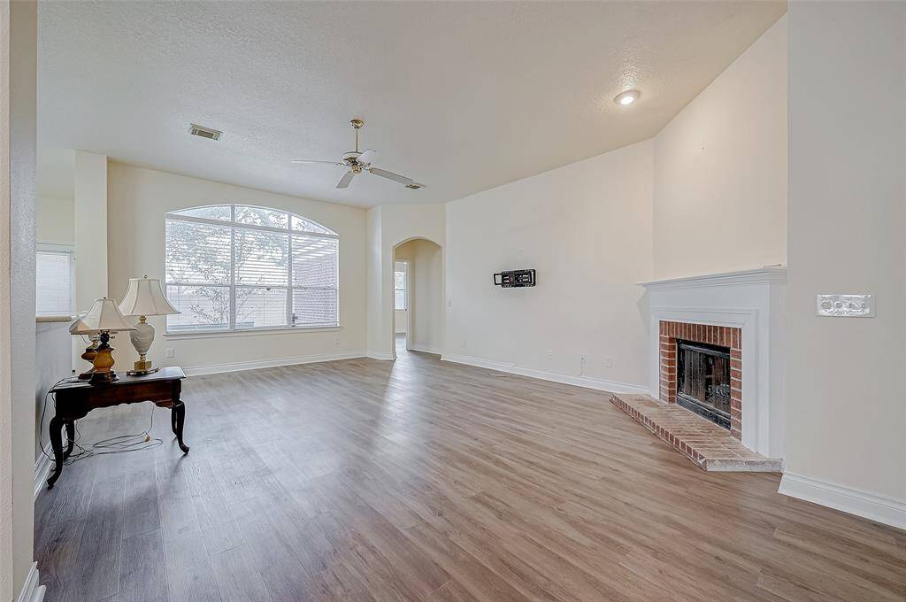 living area to door of primary bedroom