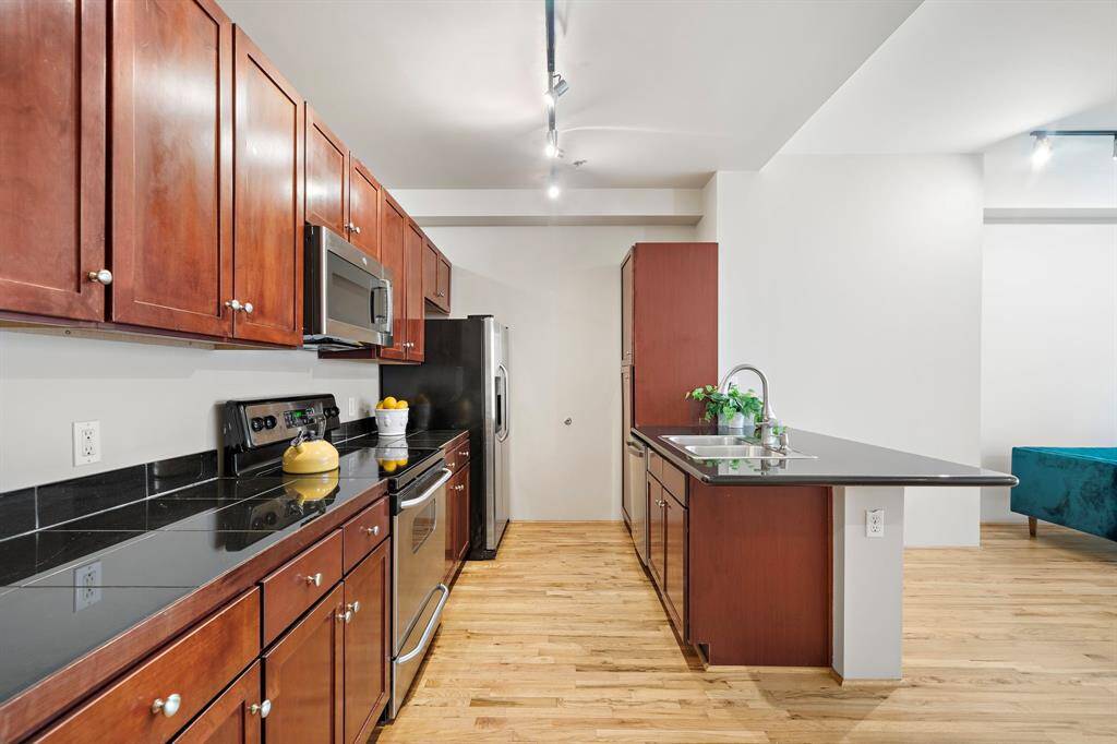 Plenty of cabinet storage space. Behind this wall is the bedroom.